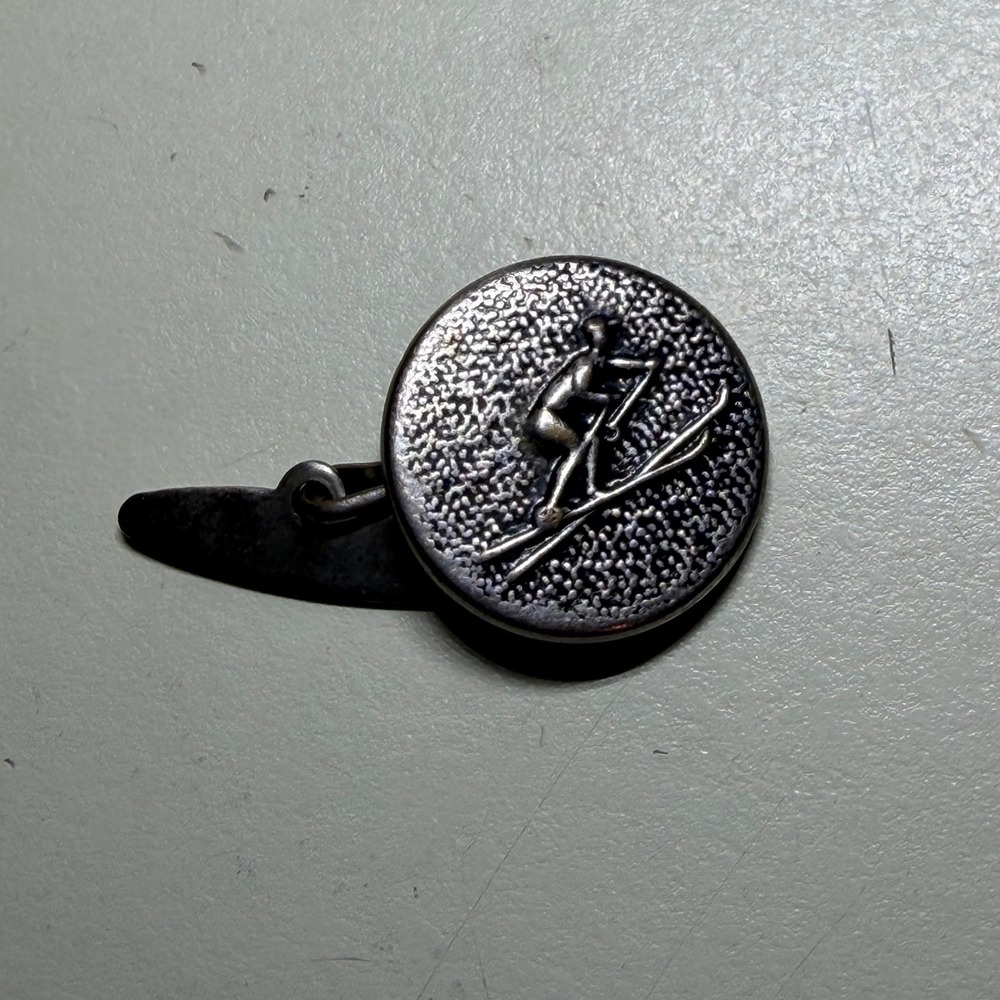 Vintage Silver Tone Downhill Skier Cufflink Single Round Textured Winter Sports